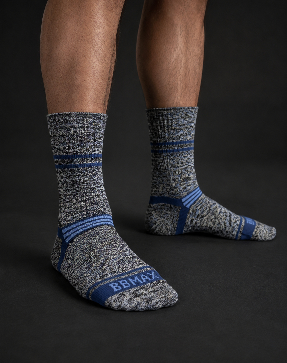 Blue and grey HOTPOT hiking socks worn on feet